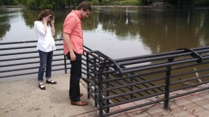 Margaret and Taylor survey the floodwaters and the floating debris