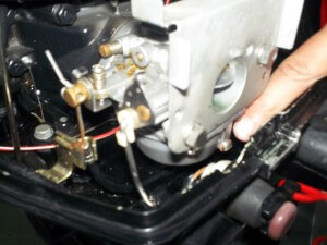 The carburetor and the "crud" drain.