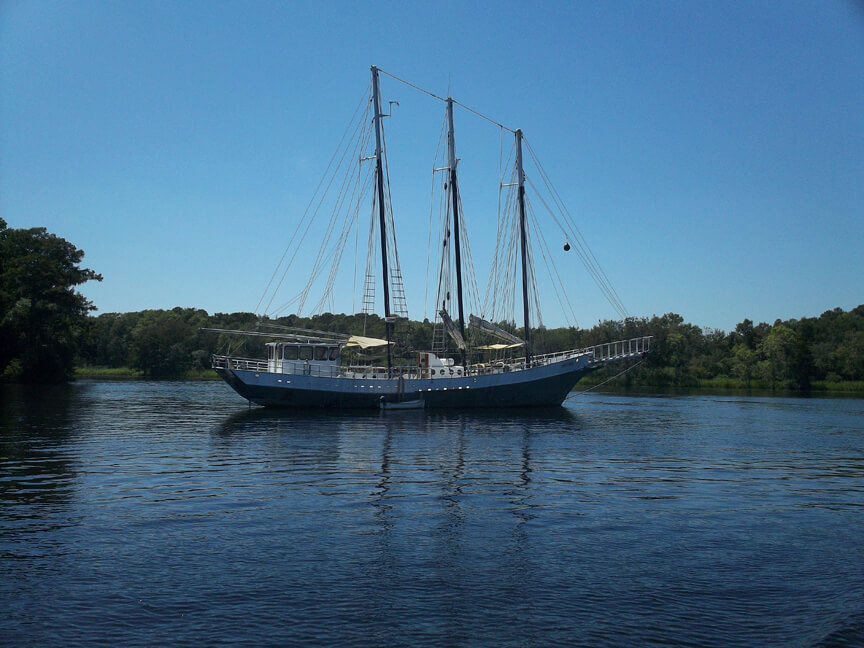 The only thing to break the monotony of the Waccamaw: a three-masted schooner anchored up