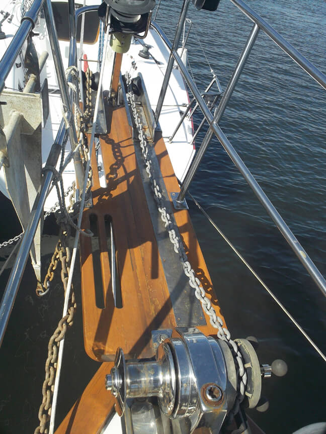 Our bow sprit with windlass and Danforth. The Bruce is out on the floating dock to the left of the picture.