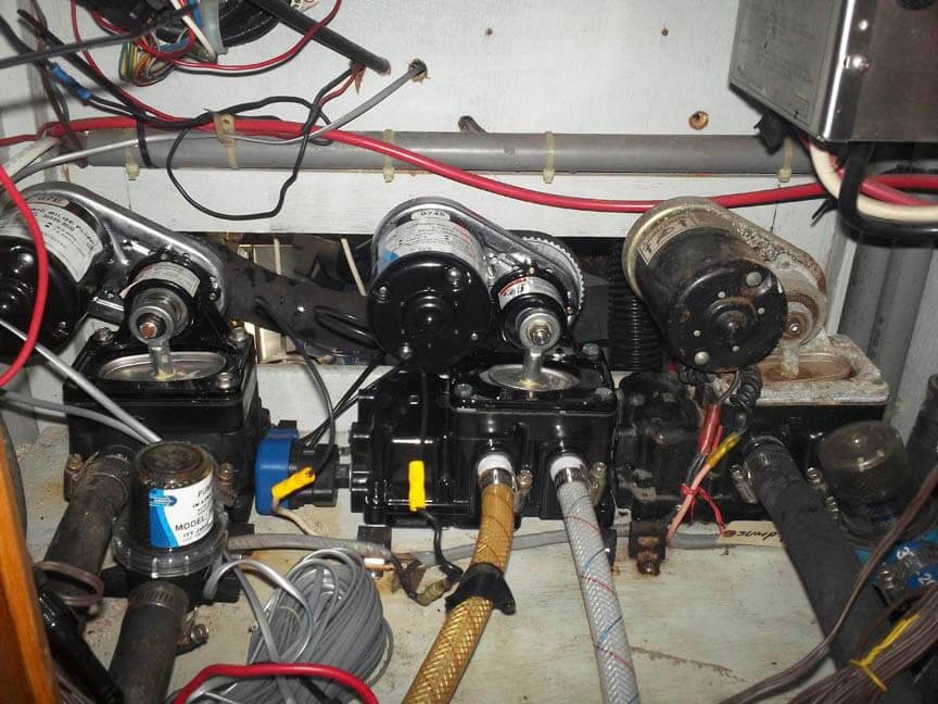 From left to right, our bilge, fresh water, and sump pumps