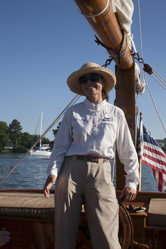 Captain Iris at the helm