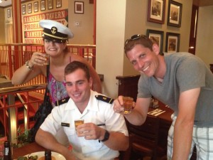 Our friends, Shawn and Brian, having a drink with a Naval Academy cadet