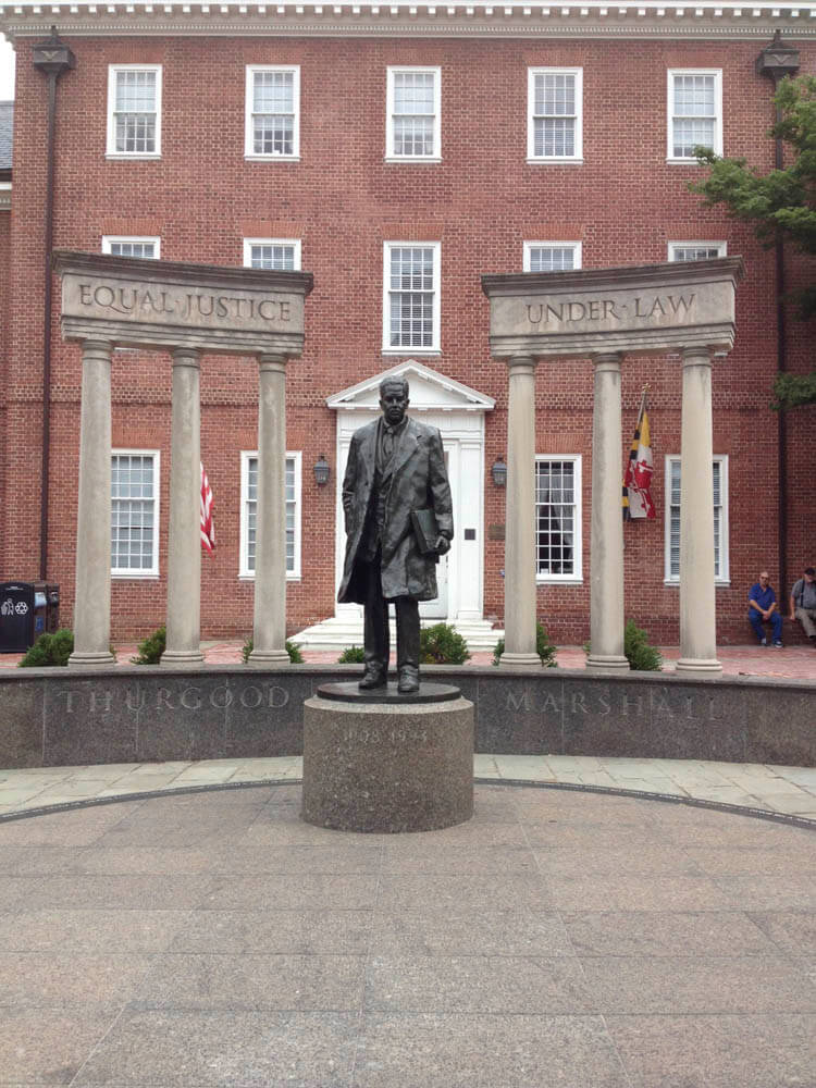 Thurgood Marshall, on the opposite side of the capitol building from Taney
