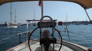 The view from our cockpit this morning...and every morning here in Newport. We are right at the southern end of Goat Island with the channel to our port and, in the left of the picture, Ticonderoga of Greenwich off our stern.