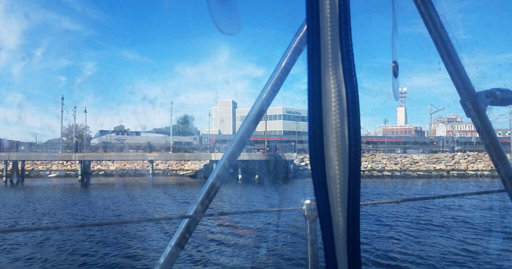 Amtrak train through a salt-encrusted cockpit enclosure