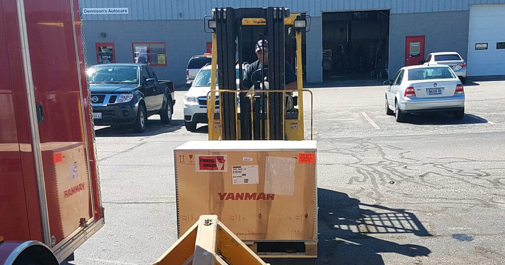 A Yanmar crate on a forklift.