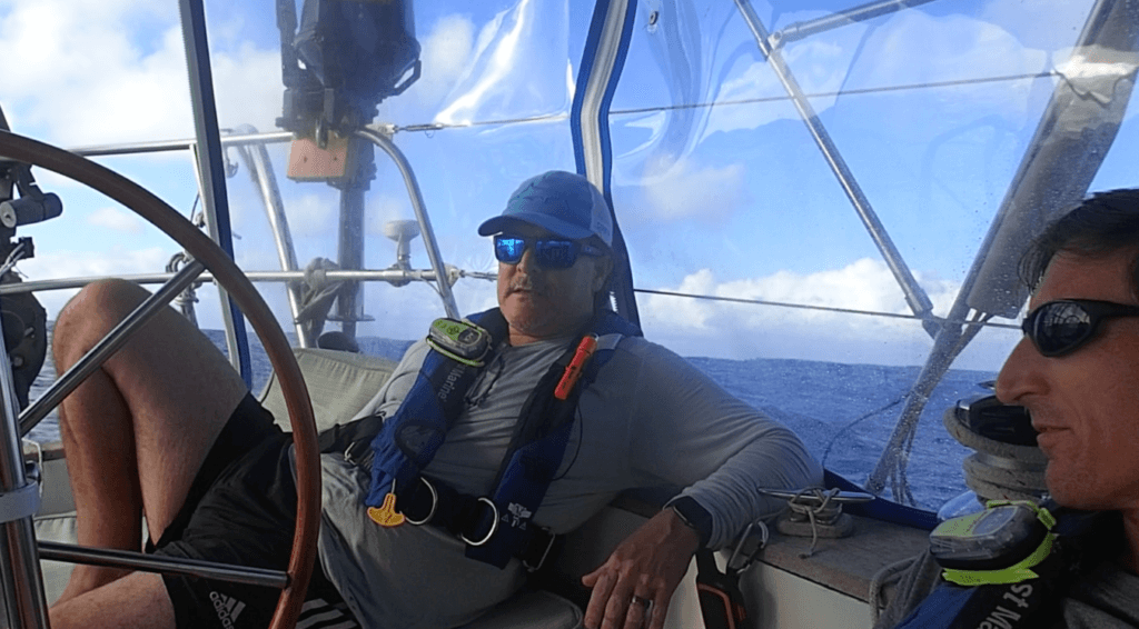 Felipe relaxing in the cockpit during the passage.