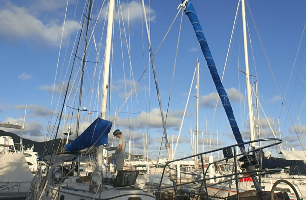 No sail on the inner forestay, and Jeff at the mast preparing to go aloft.